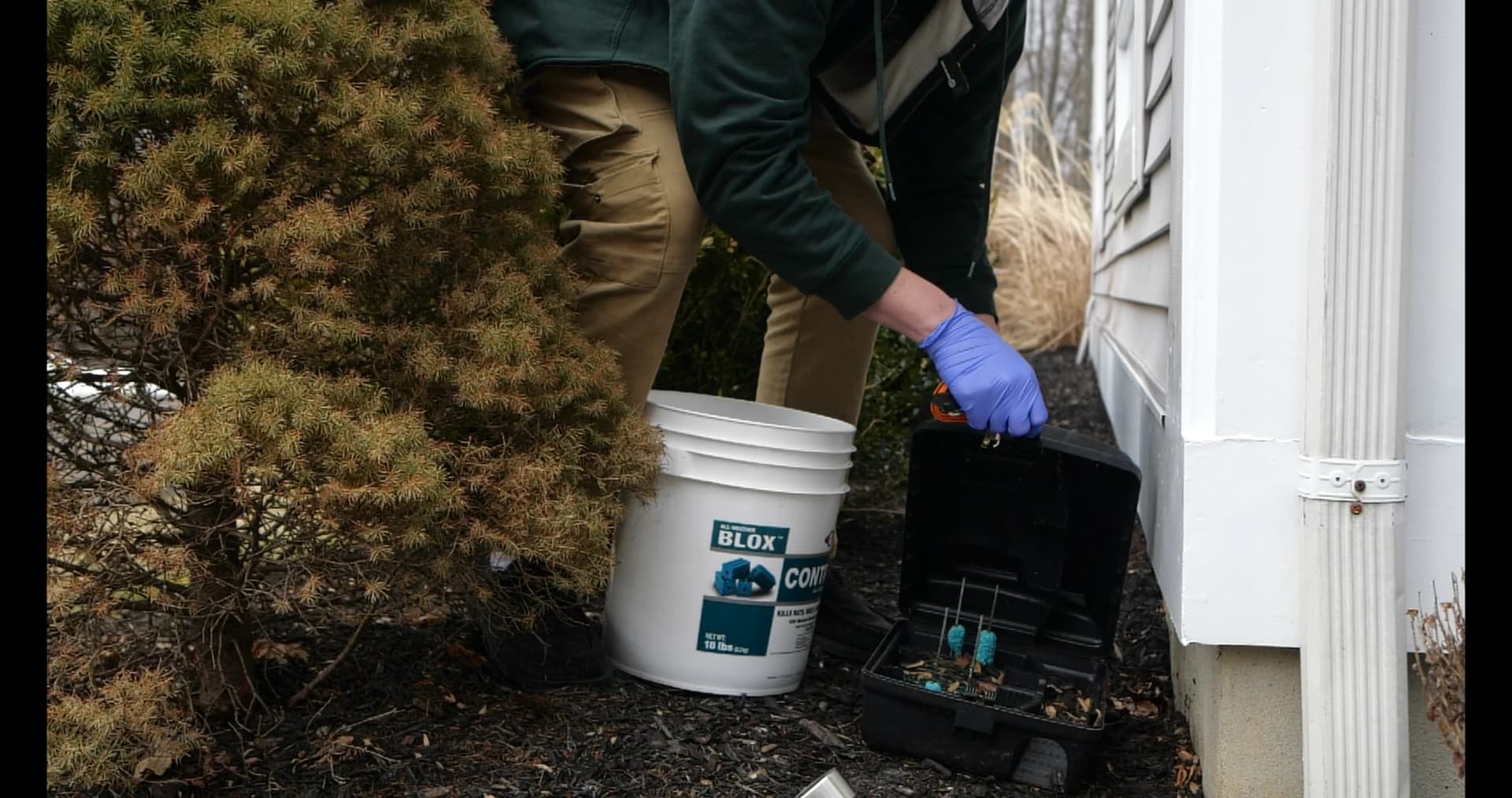 Hennebry Pest Solutions team member providing residential pest control service